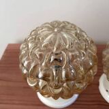 Paire d’appliques murales globes en verre doré