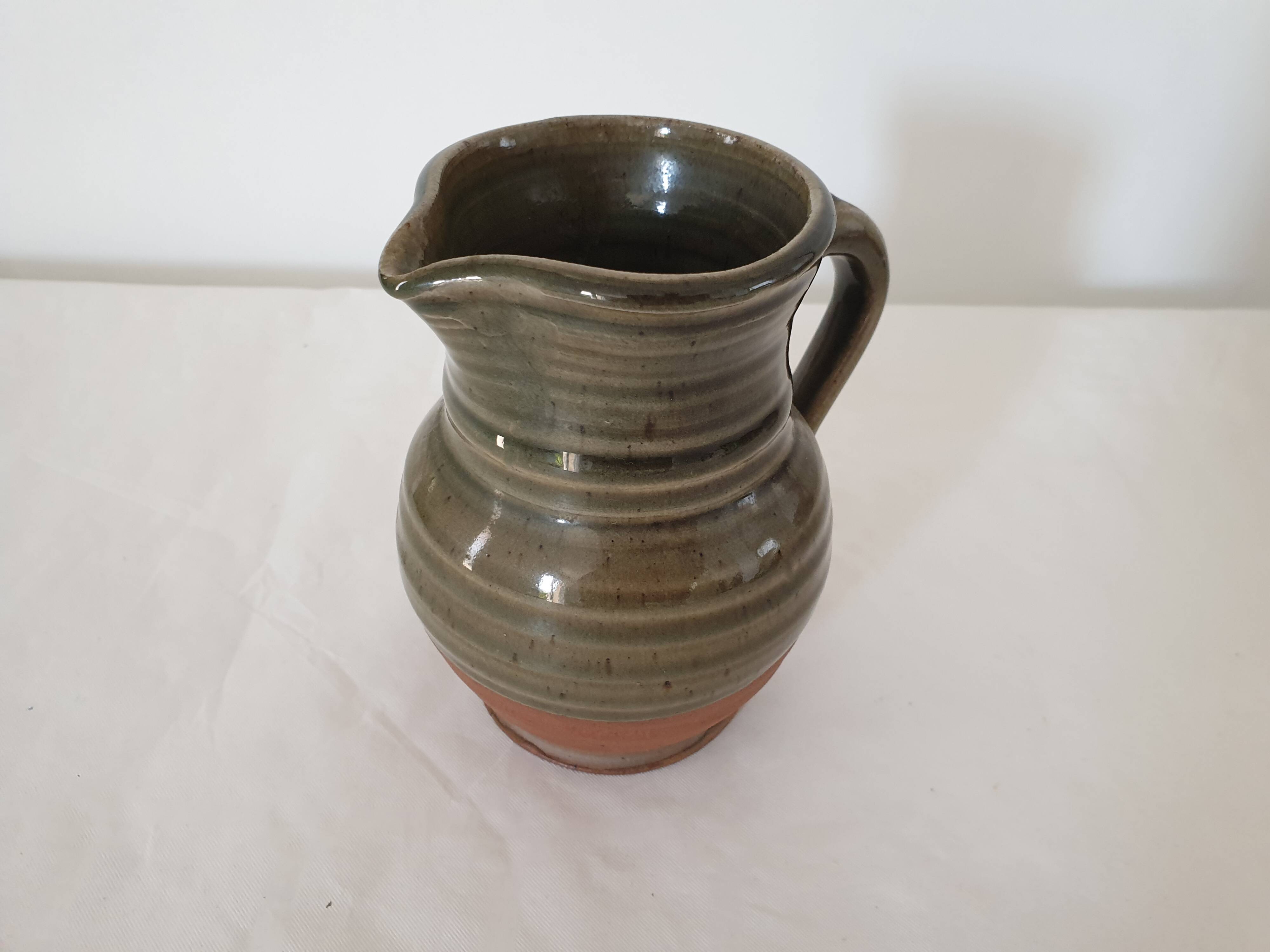 Small pitcher in glazed ceramic signed JC Seguin Puisaye (pictogram)