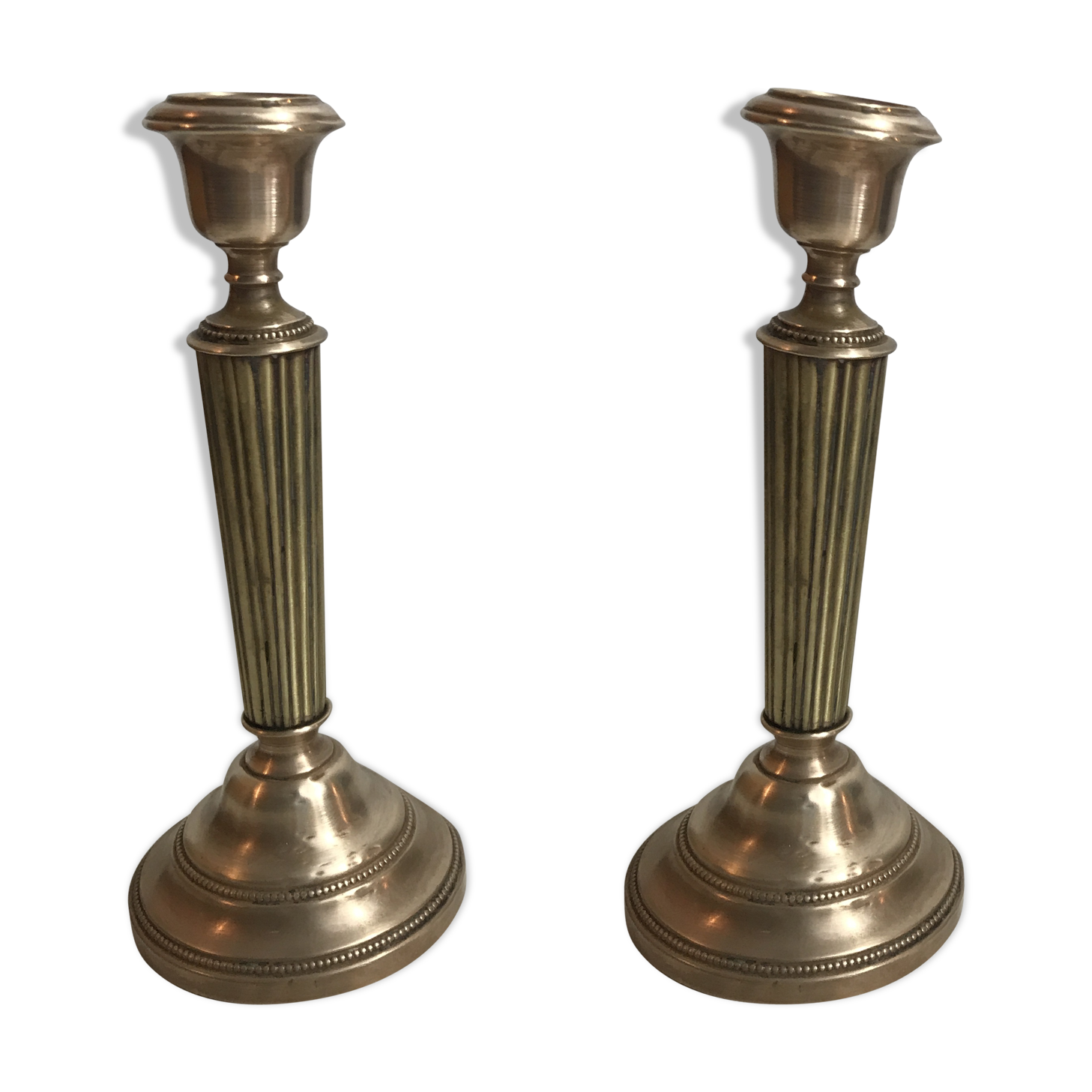 Pair of old brass candlesticks