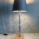 Golden metal lamp with pink marble base
