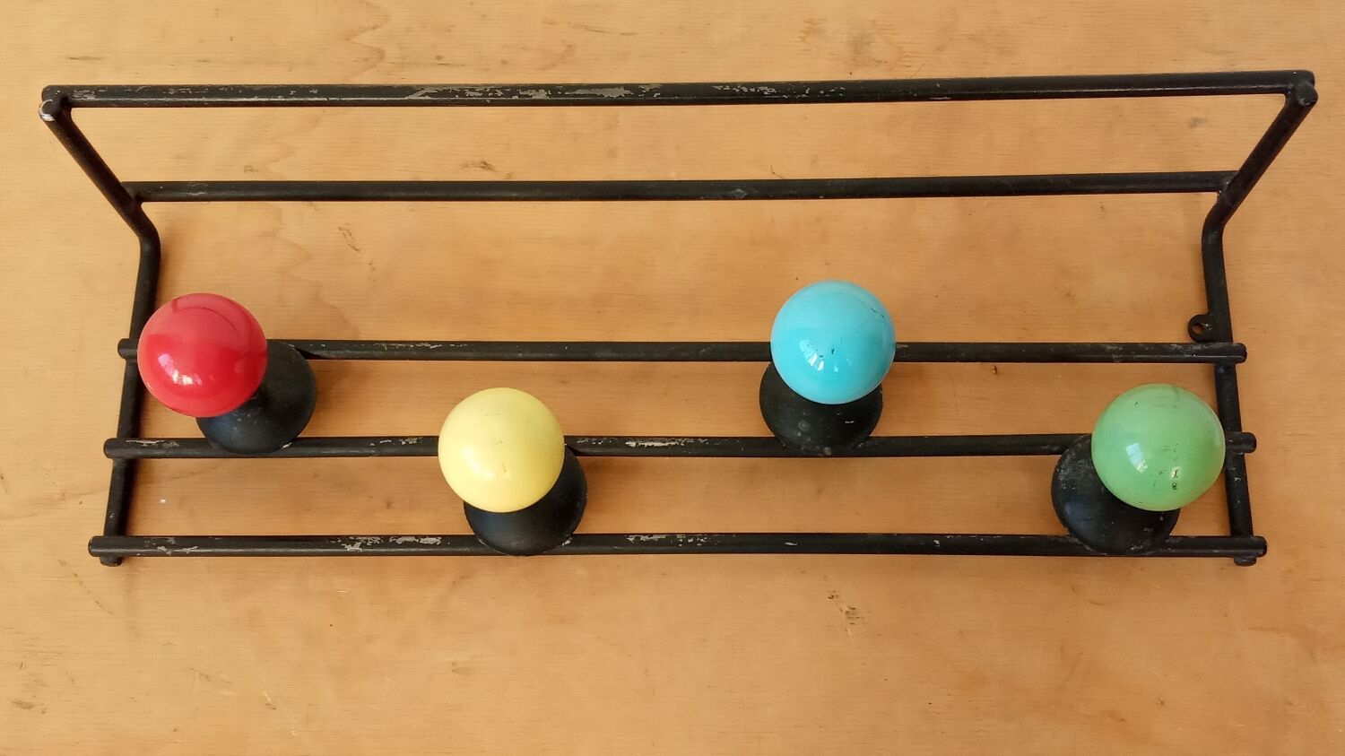50s coat rack with multicolored balls