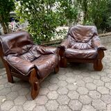 2 Brutalist armchairs in wood and leather 1970