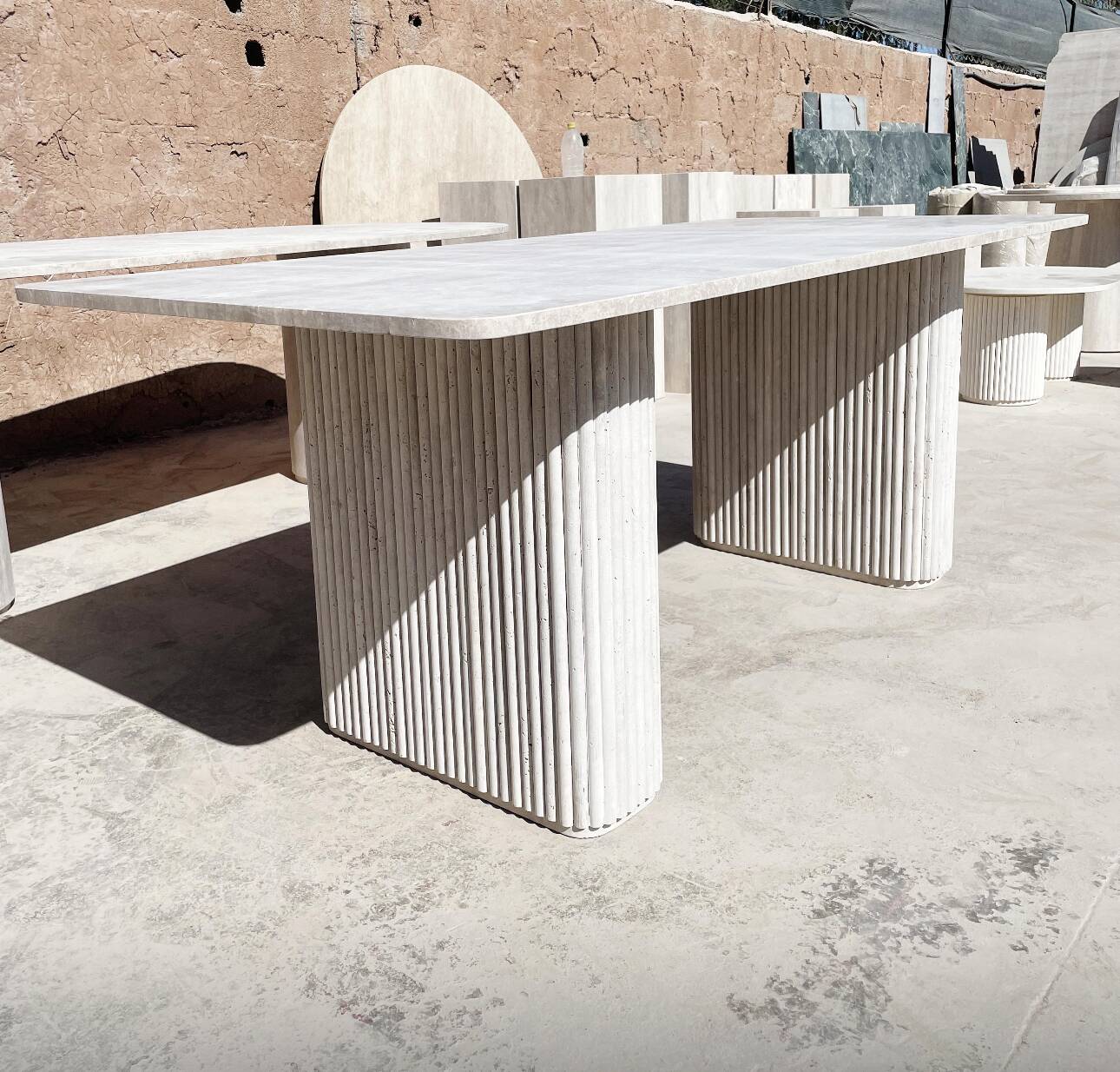 Dining table in travertine