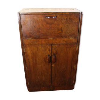 Walnut cocktail cabinet with glasses