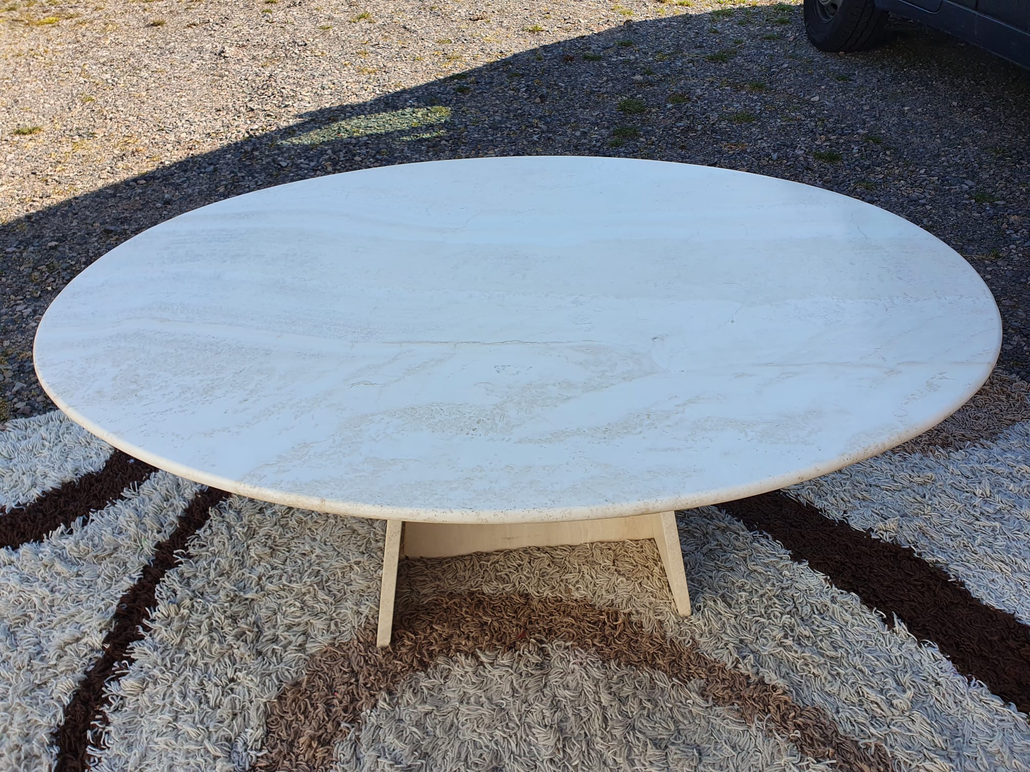 Oval travertine coffee table
