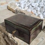 Leather jewelry box with its key