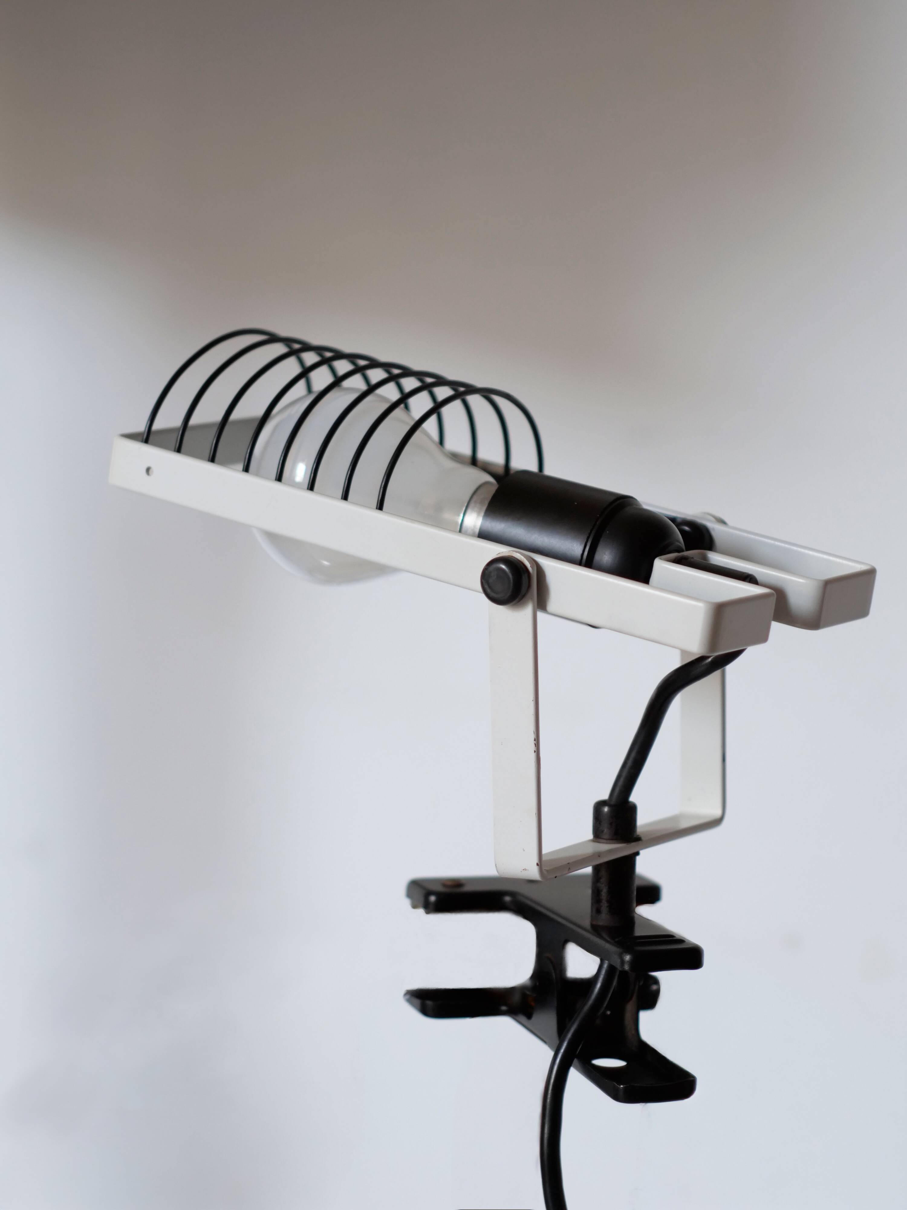 Artemide clamp lamp designed by Ernesto Gismondi model Sintesi