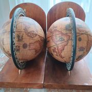 Pair of vintage bookends with rotating terrestrial globes on wooden bases in Spain