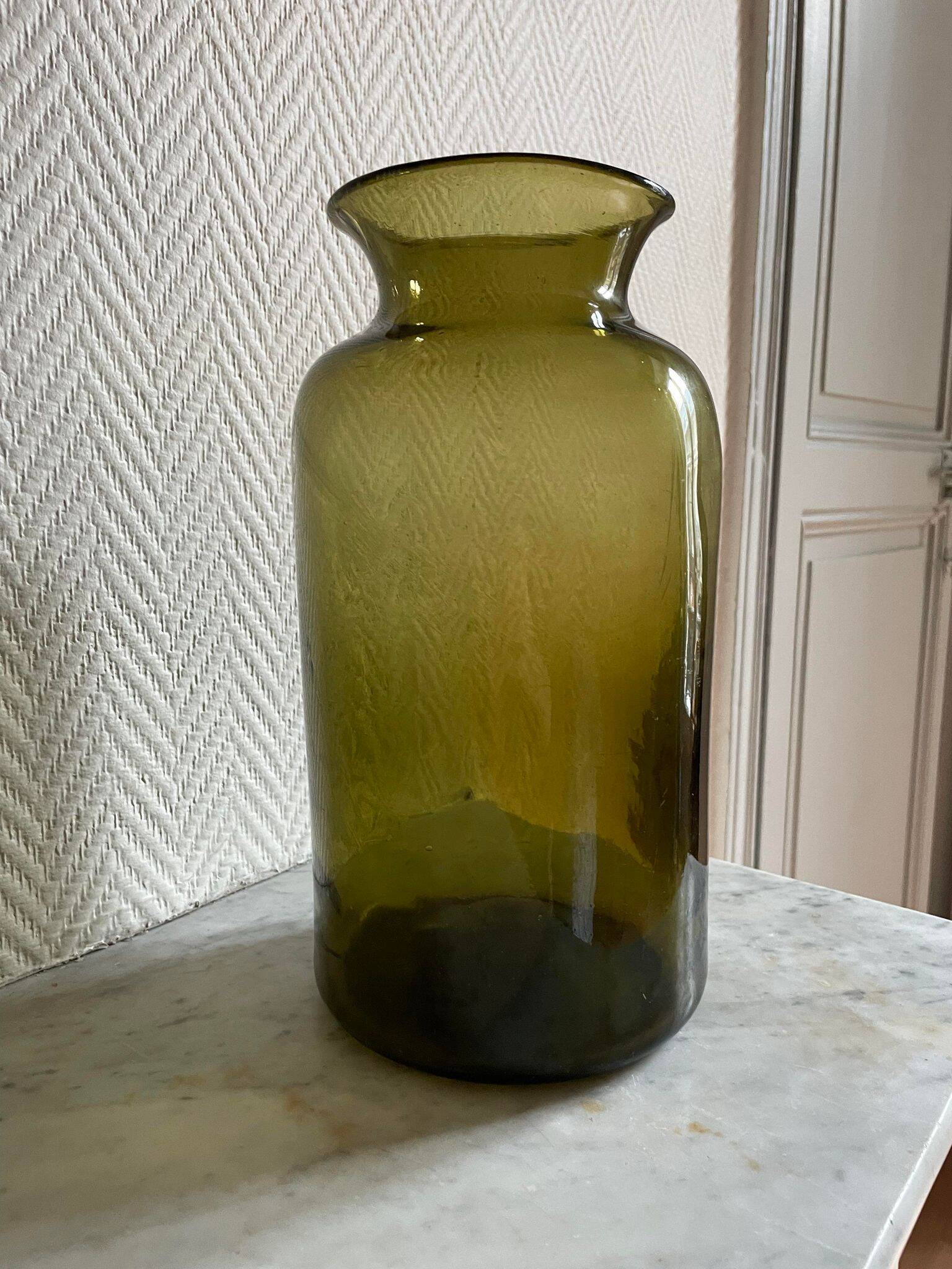 Large green blown glass vase