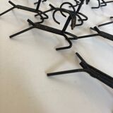 Set de 12 porte couteaux 1970 art populaire en fer brut