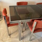 Glass table from the 1970s roche and bobois with 6 chairs
