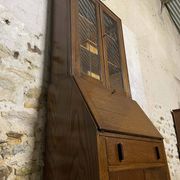 Oak display secretary cabinet with drop-down front, two sections.