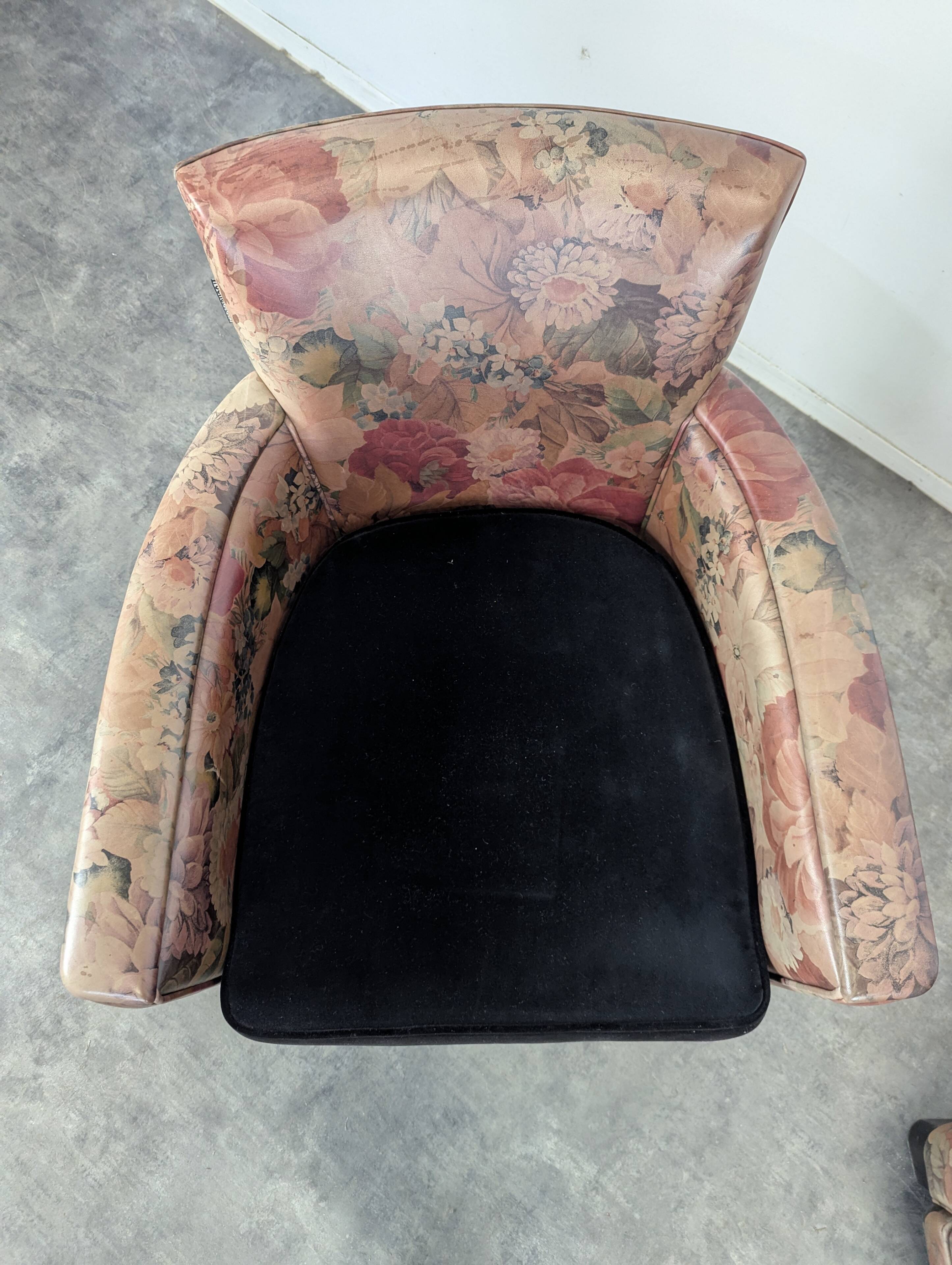 Pair of Roche Bobois armchairs with floral patterns.
