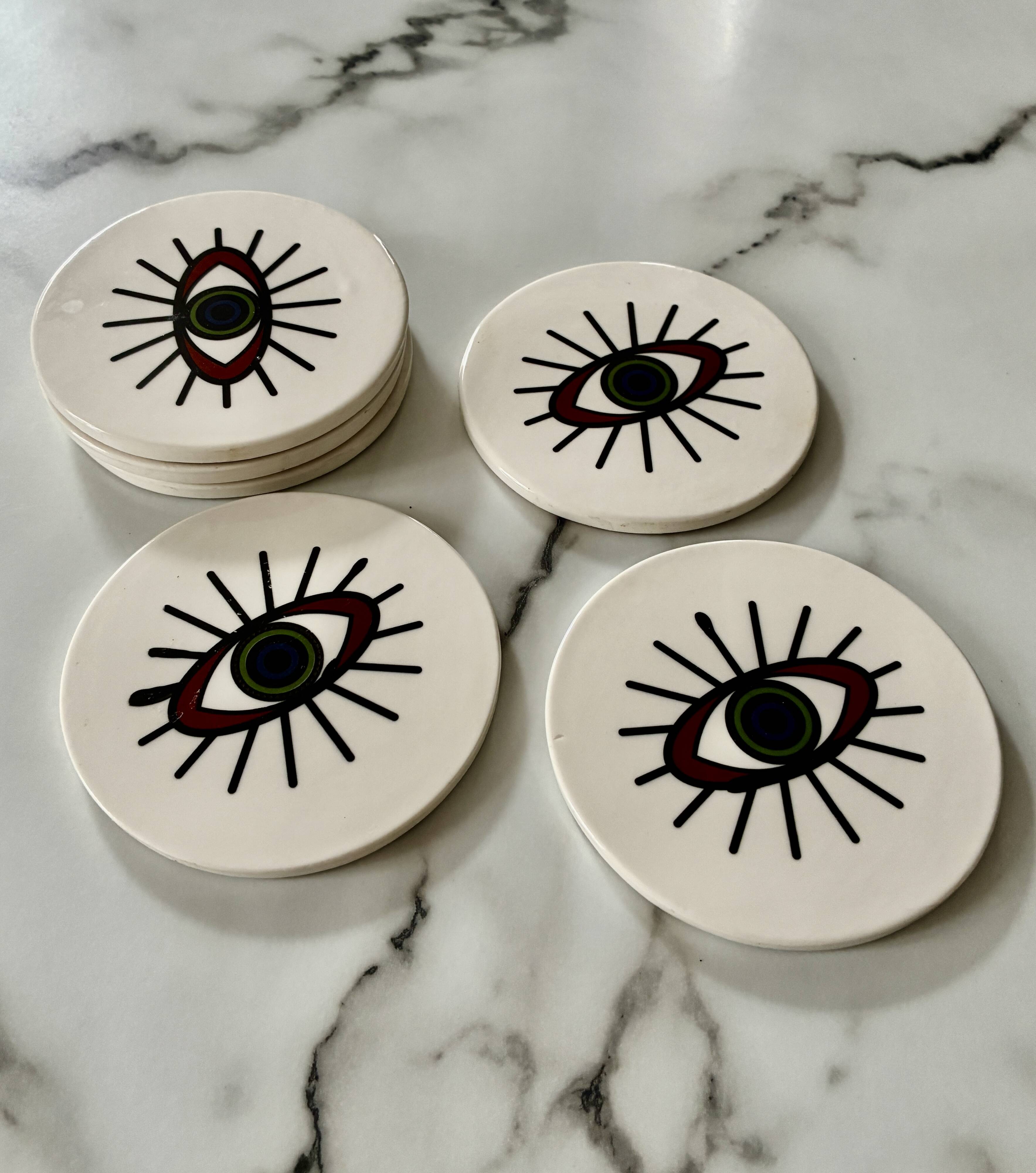 Lot of 6 ethnic ceramic coasters with eye design.