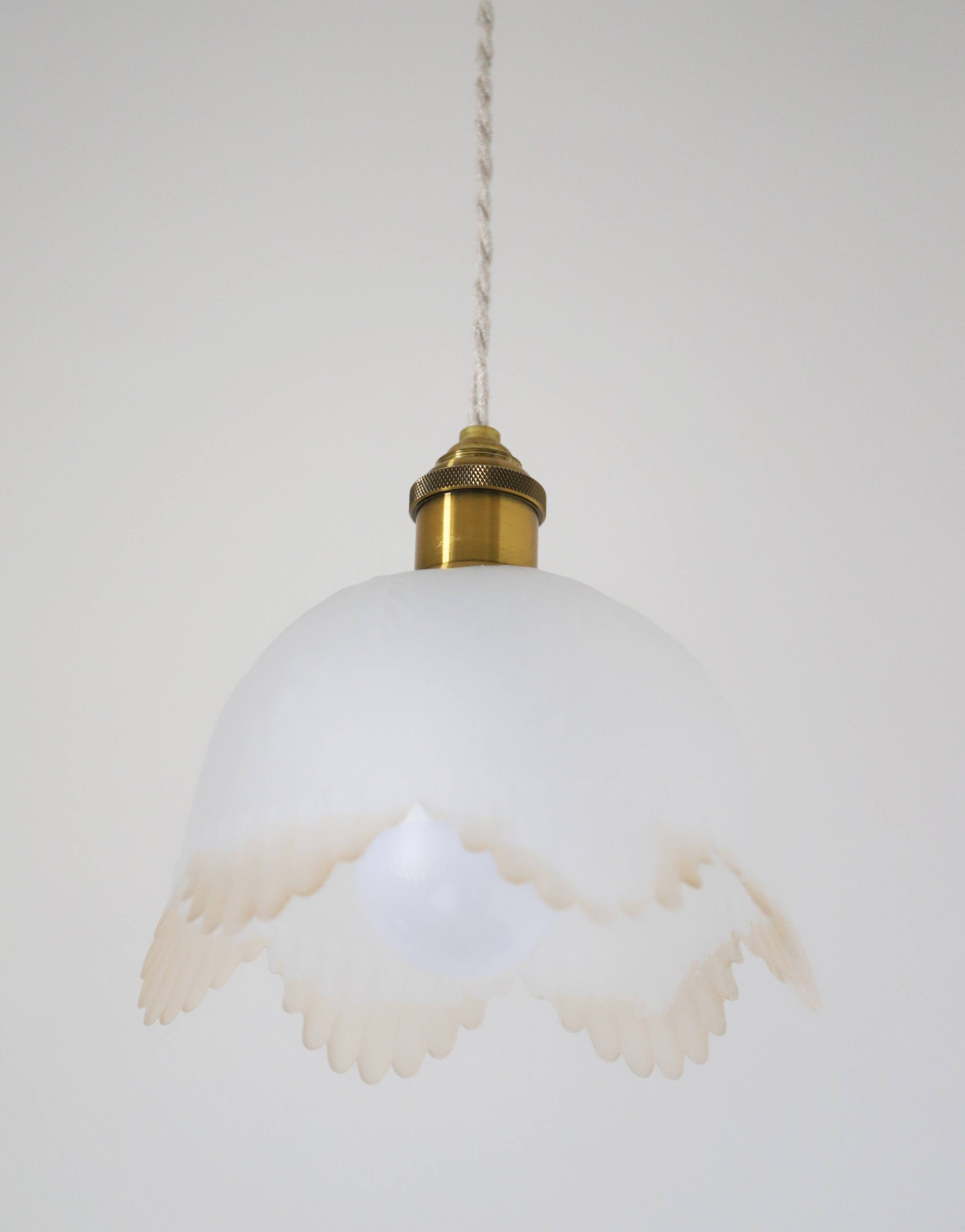 Frosted glass pendant light with floral pattern and wavy edge