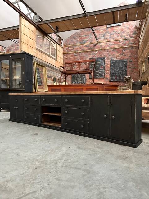 Old piece of furniture transformed into a TV stand