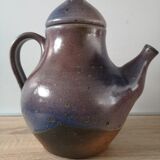 Lidded sandstone carafe