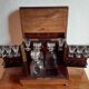 Old-fashioned glass liquor cellar and St Louis crystal decanters