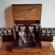 Old-fashioned glass liquor cellar and St Louis crystal decanters