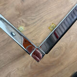 Large designer coffee table from the 70s in chrome, smoked glass, and faux leather.