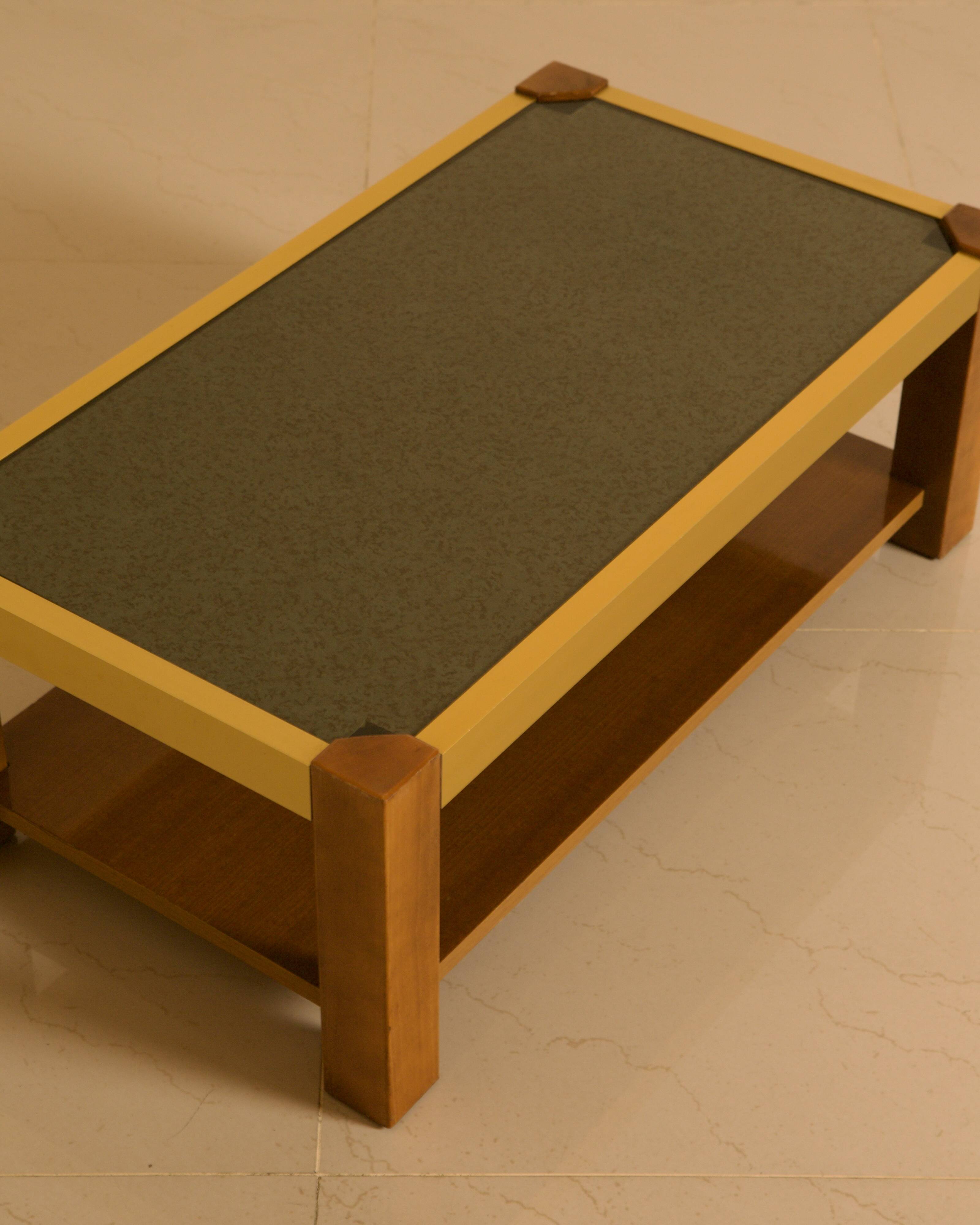 Rectangular Italian coffee table in wood and gold metal from the 70s.