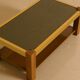 Rectangular Italian coffee table in wood and gold metal from the 70s.