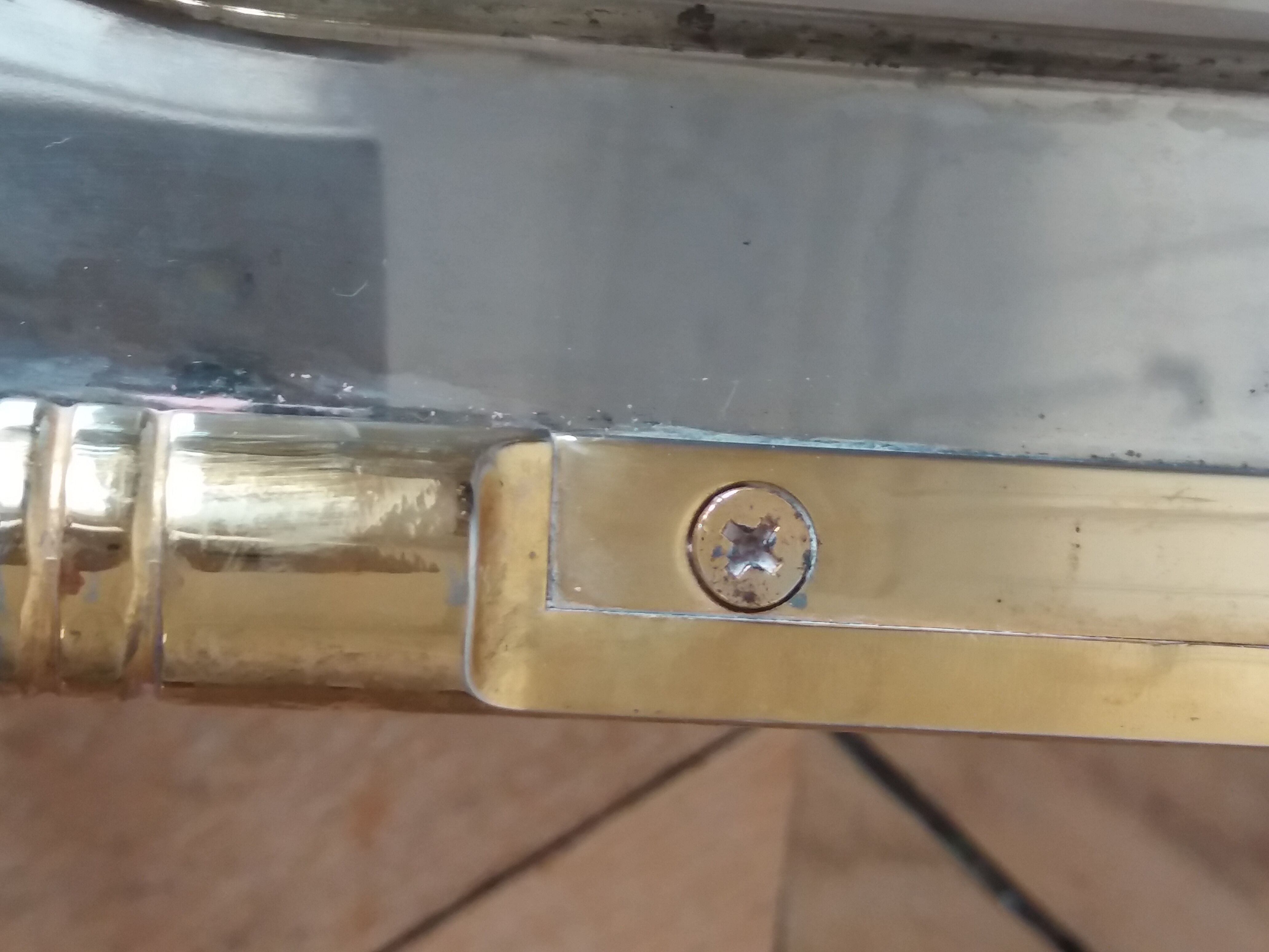 Silver metal and brass tray