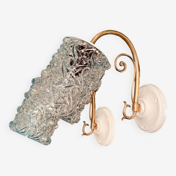 Large pair of brass swan neck wall lights, transparent molded glass globes, porcelain rosette