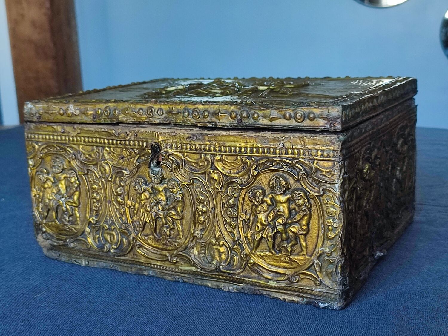 Old wooden box/casket covered with brass