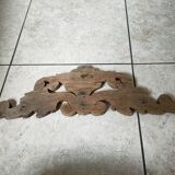 Old pediment in cut wood