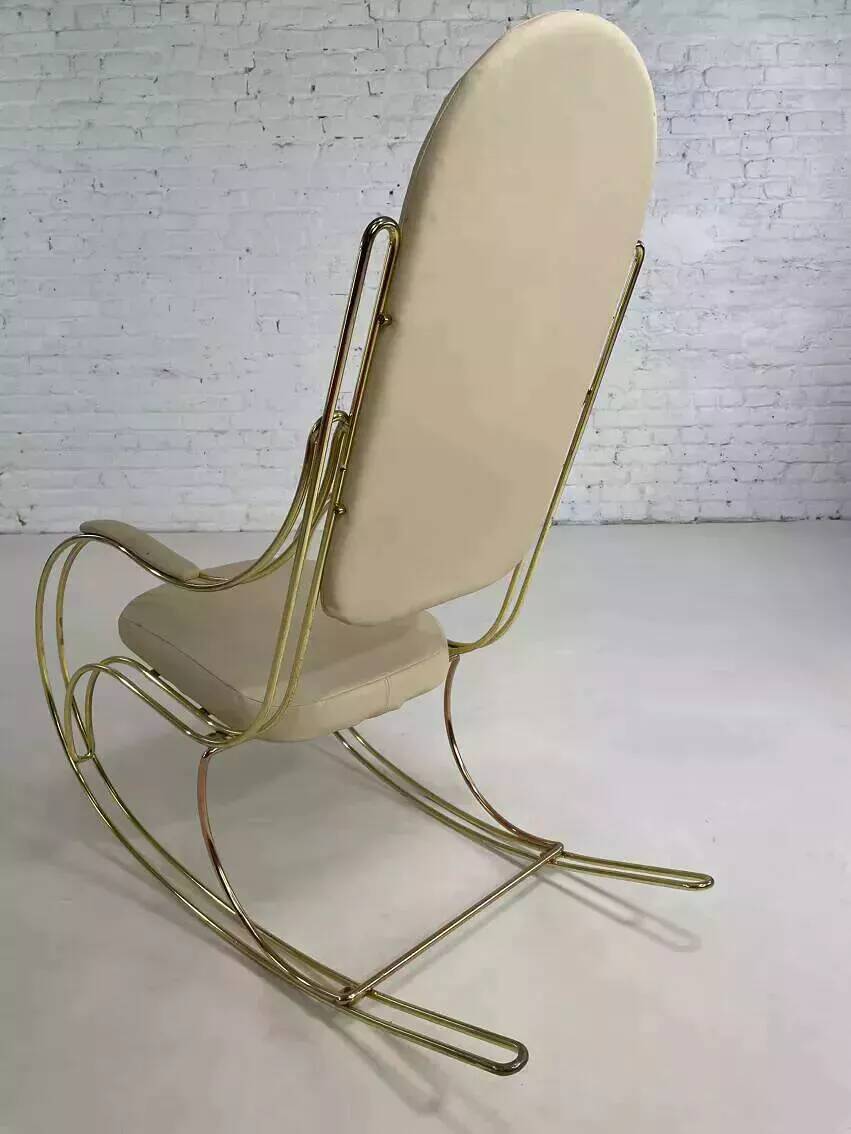 1960s rocking chair in brass and ecru imitation leather