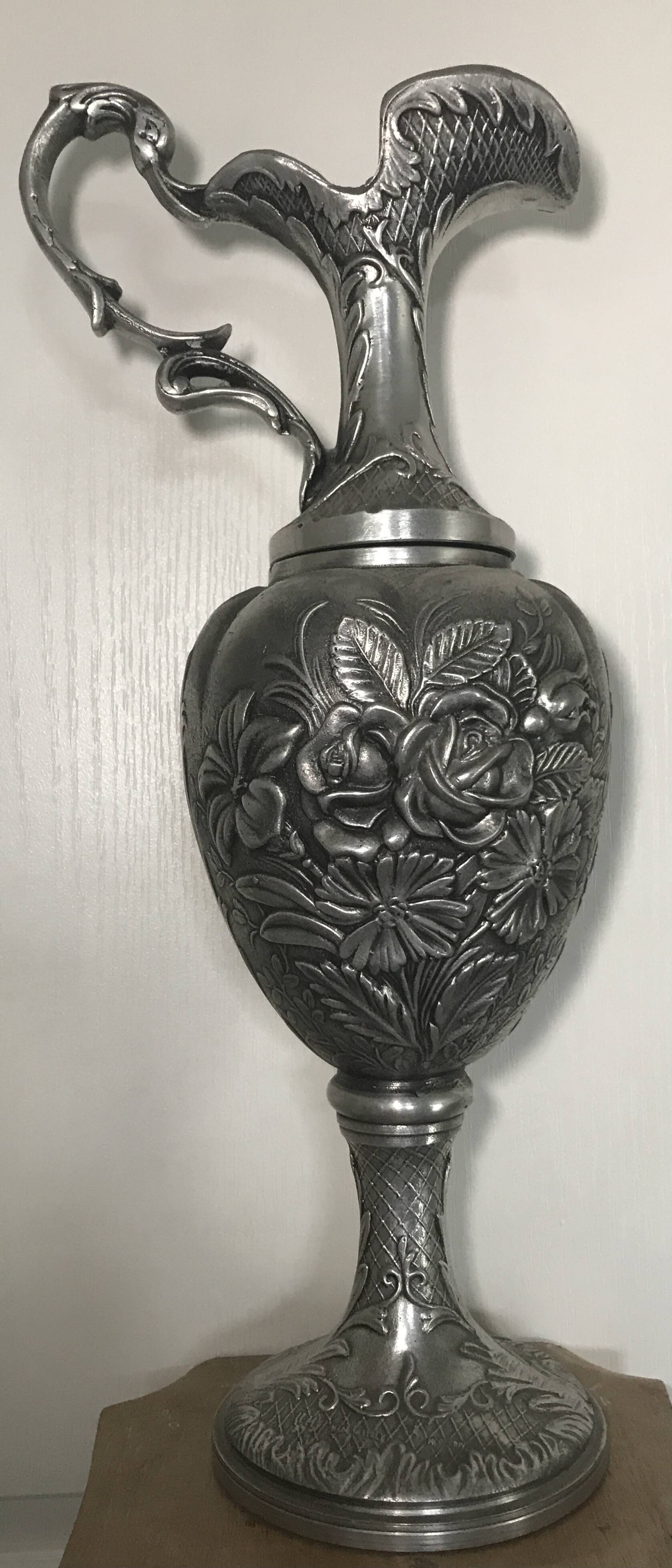 Ewer, Mauro Manetti art foundry, floral embossed decoration and bird's head handle