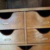 Old black wardrobe - wooden drawers and labels of origin