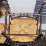 Pair of blackened wooden armchairs