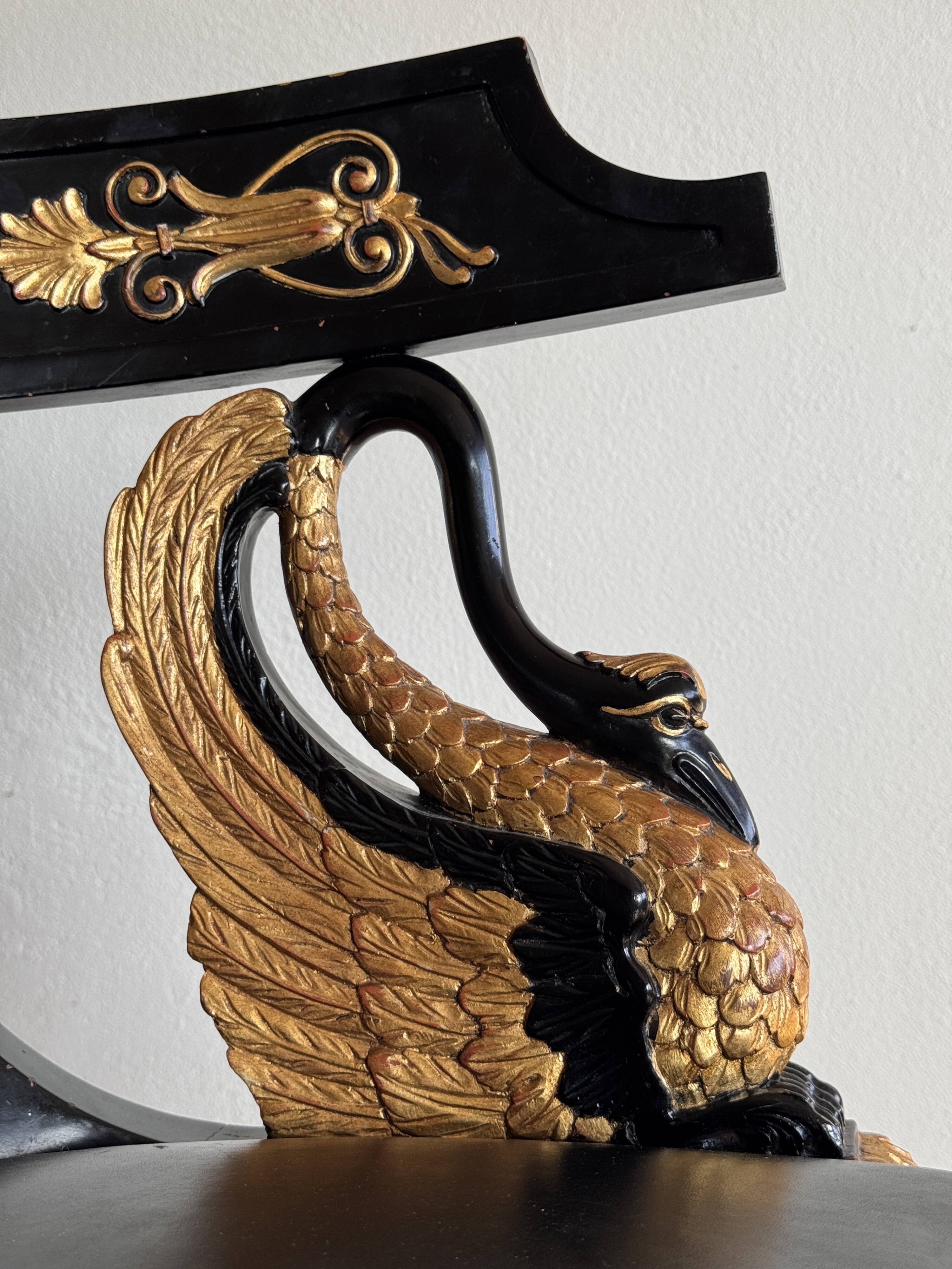 Pair of Empire-style bergère armchairs decorated with swans and lyres