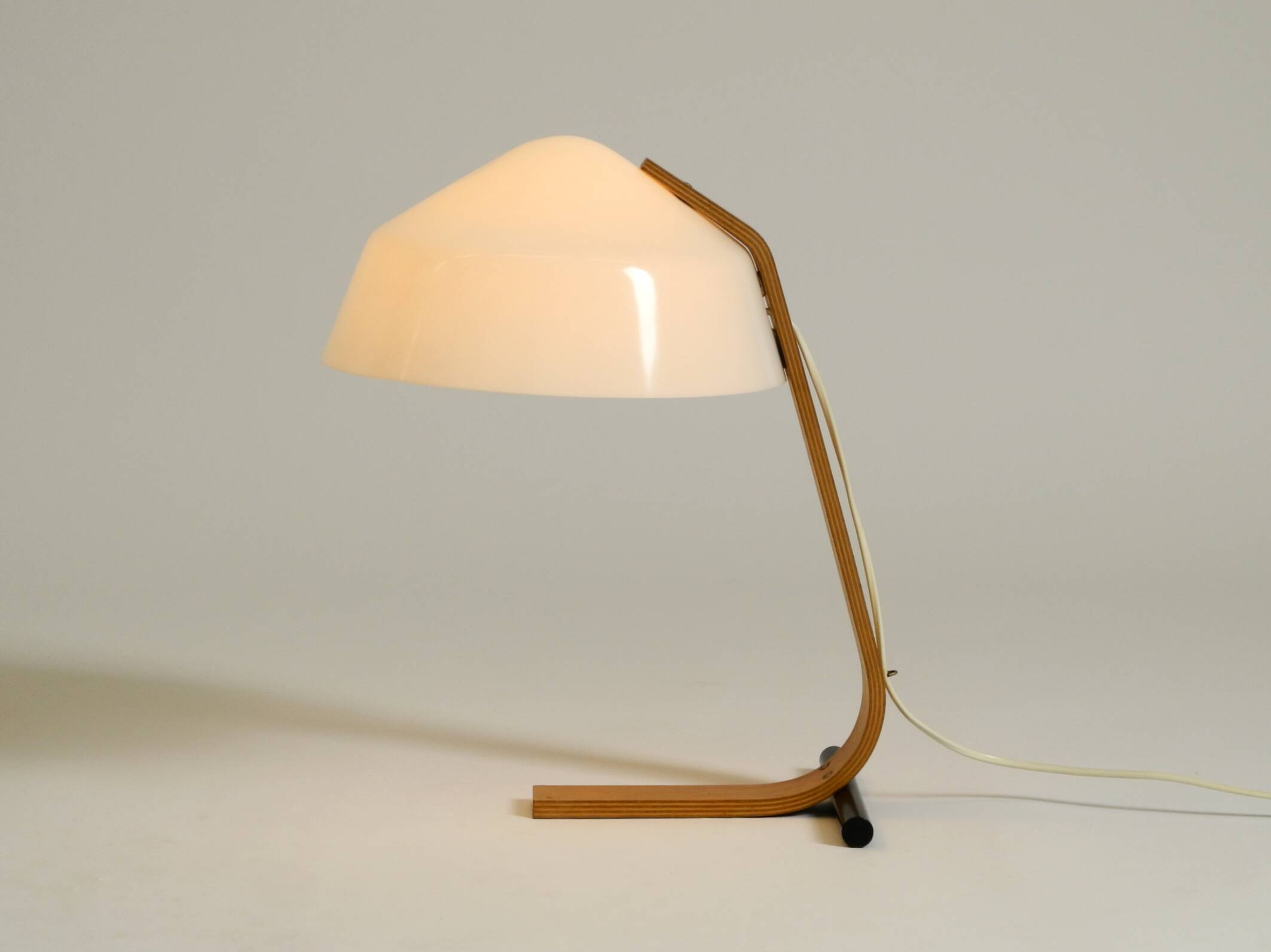 Original Space Age 1960s plywood table lamp with plastic shade by Temde