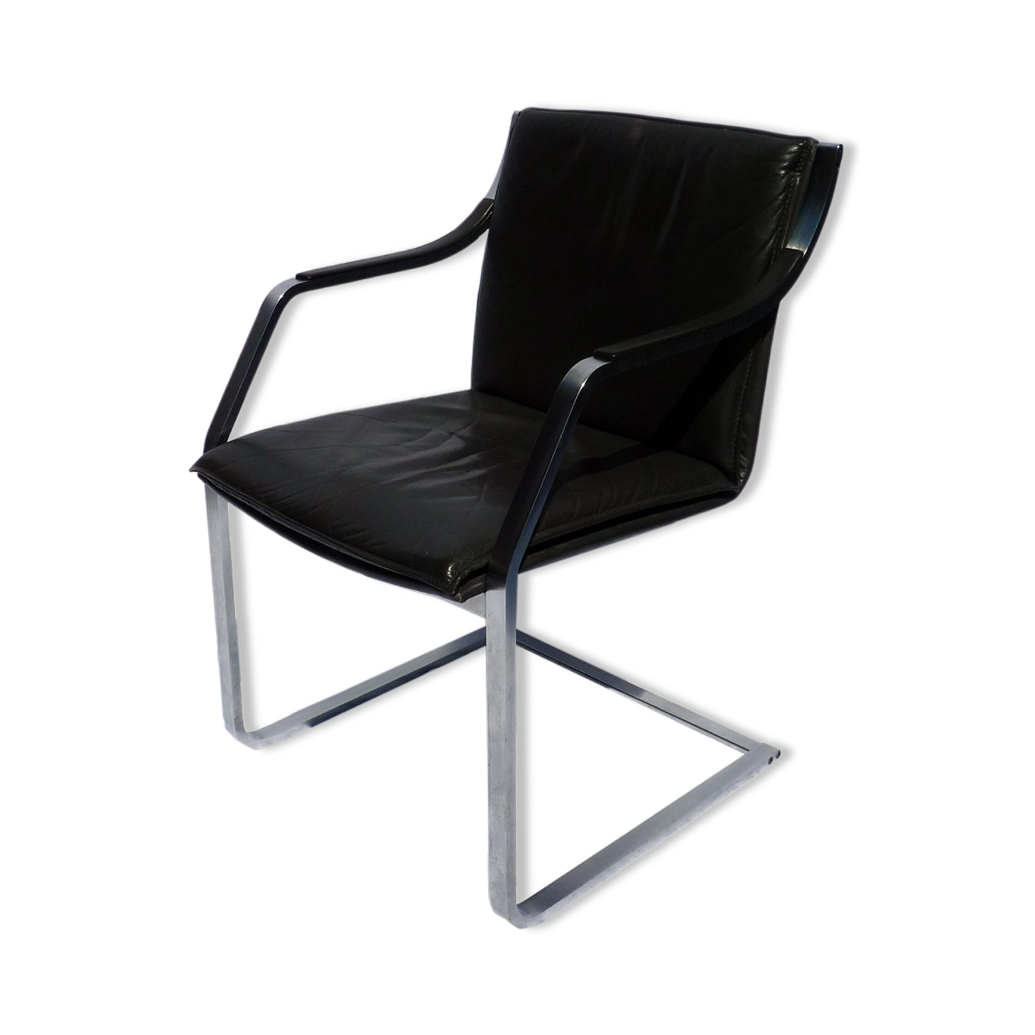 Chair with steel and leather armrests