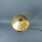 Post-Modern lamp in black metal and gilded brass.
