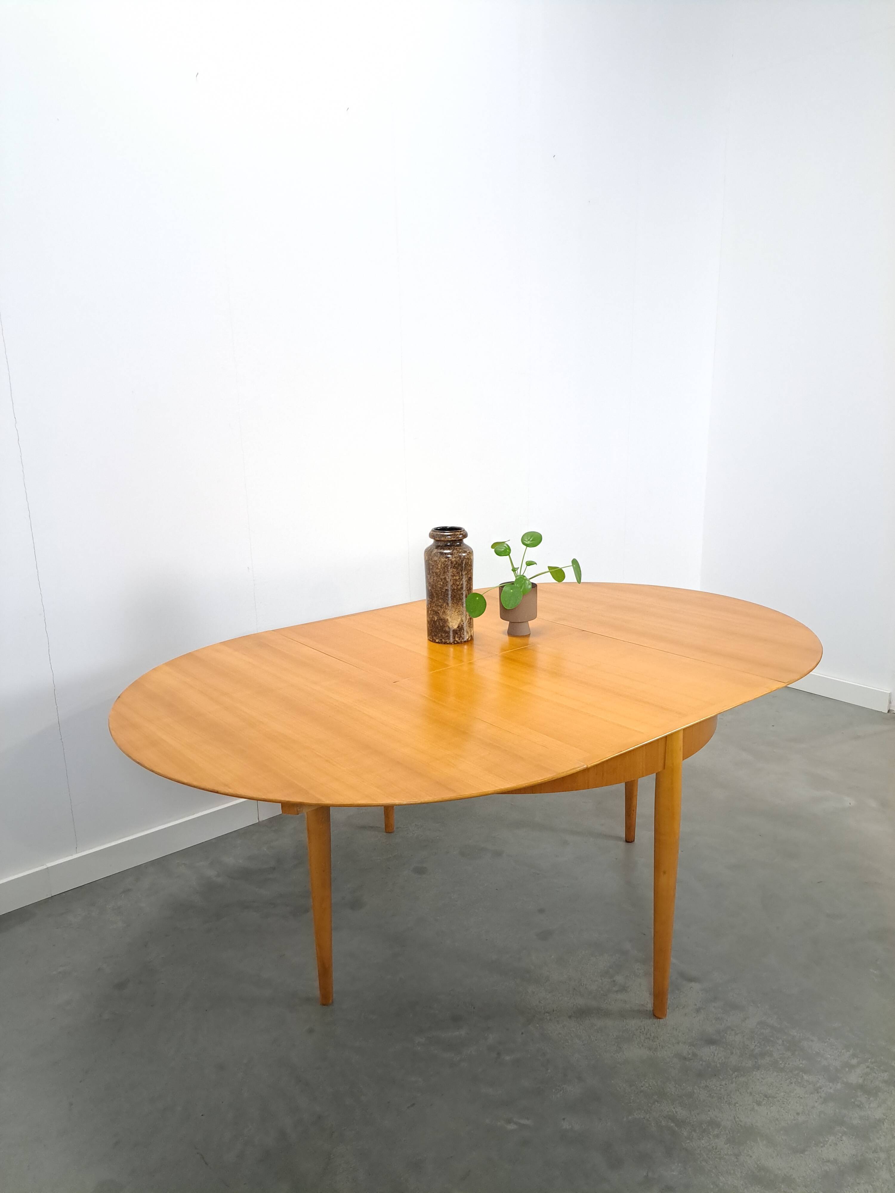 Table à manger ronde extensible Lübke design