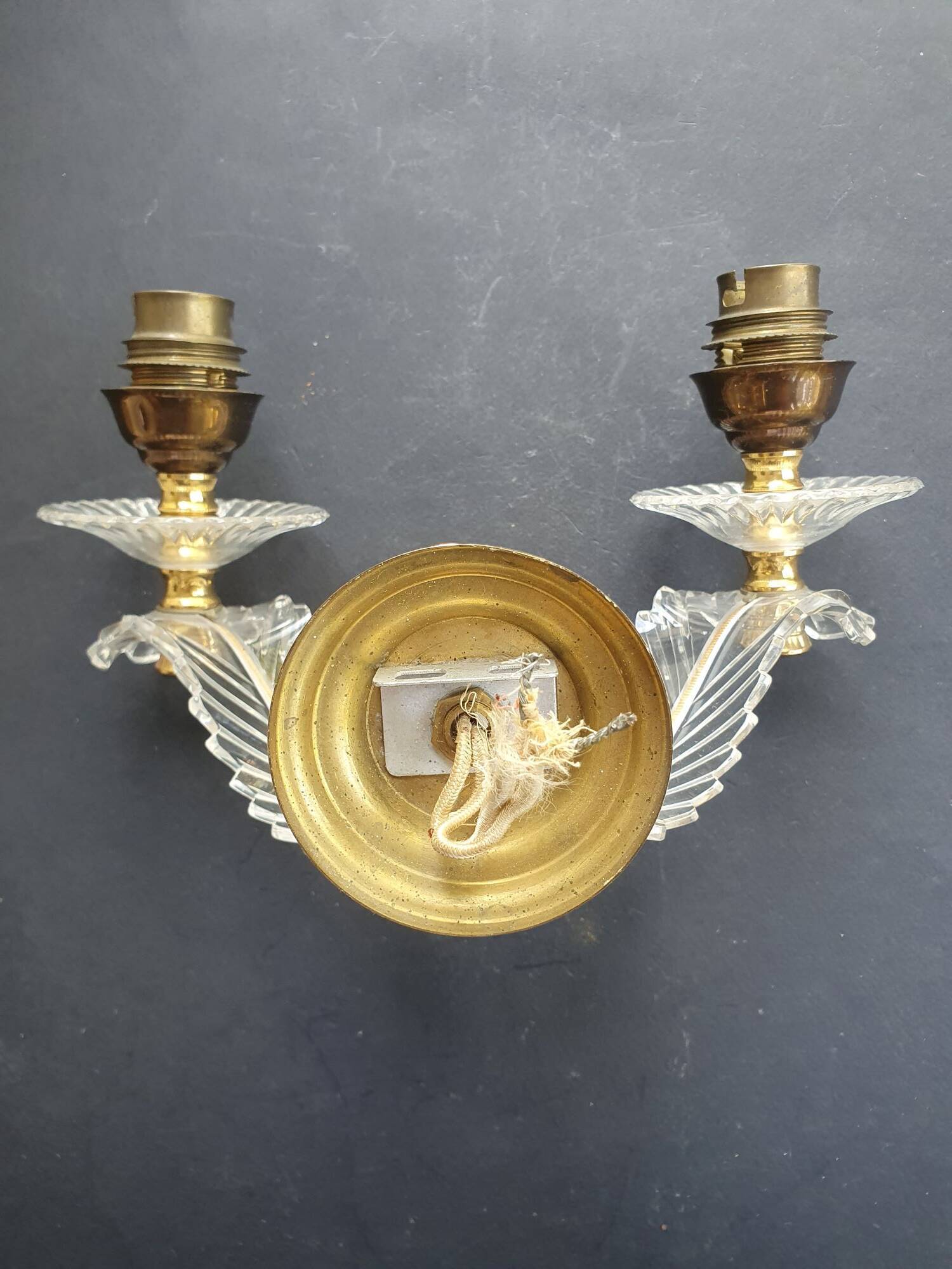 Wall lamp with palm leaf candle holders from the 1950s.