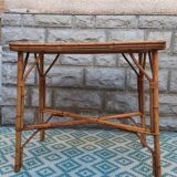 Table with bamboo legs and rattan top