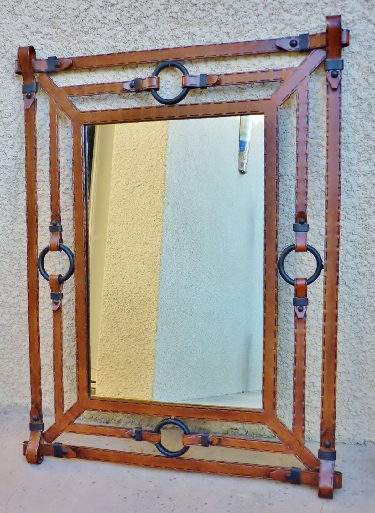 Metal mirror, wrought iron imitation leather straps and horse harness