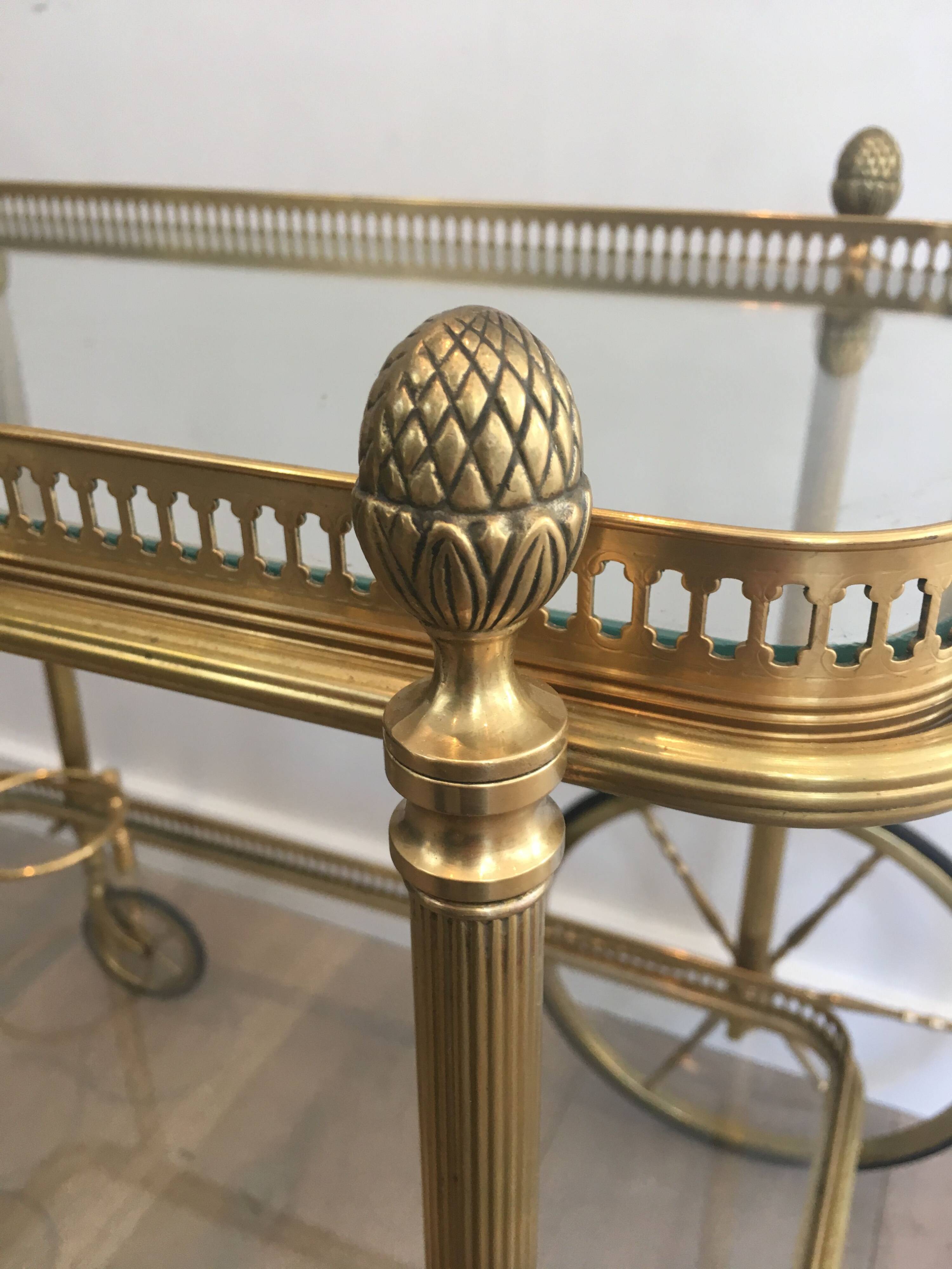 Neoclassical brass rolling table from Maison Baguès