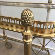 Neoclassical brass rolling table from Maison Baguès