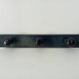 Vintage wall-mounted coat rack in lacquered wood from the 60s