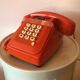Orange Socotel phone with keys from the 70s 80s