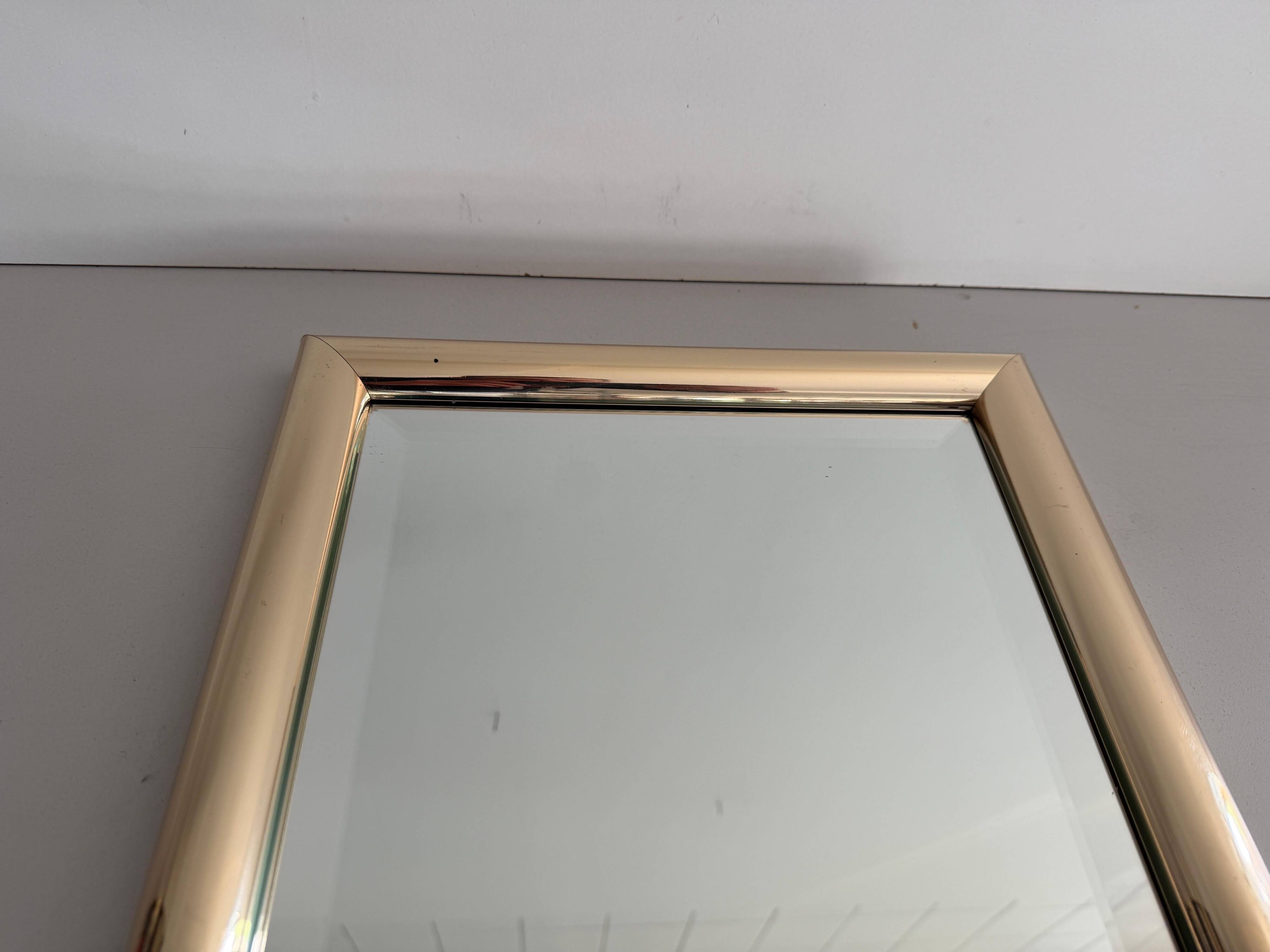 Rectangular wall mirror with a gold metal frame by Schöninger, 1970s, Germany.