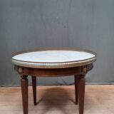 Tablr low dessu marble called "hot water bottle"