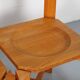 Set of 4 dining chairs in elm wood and cognac leather.