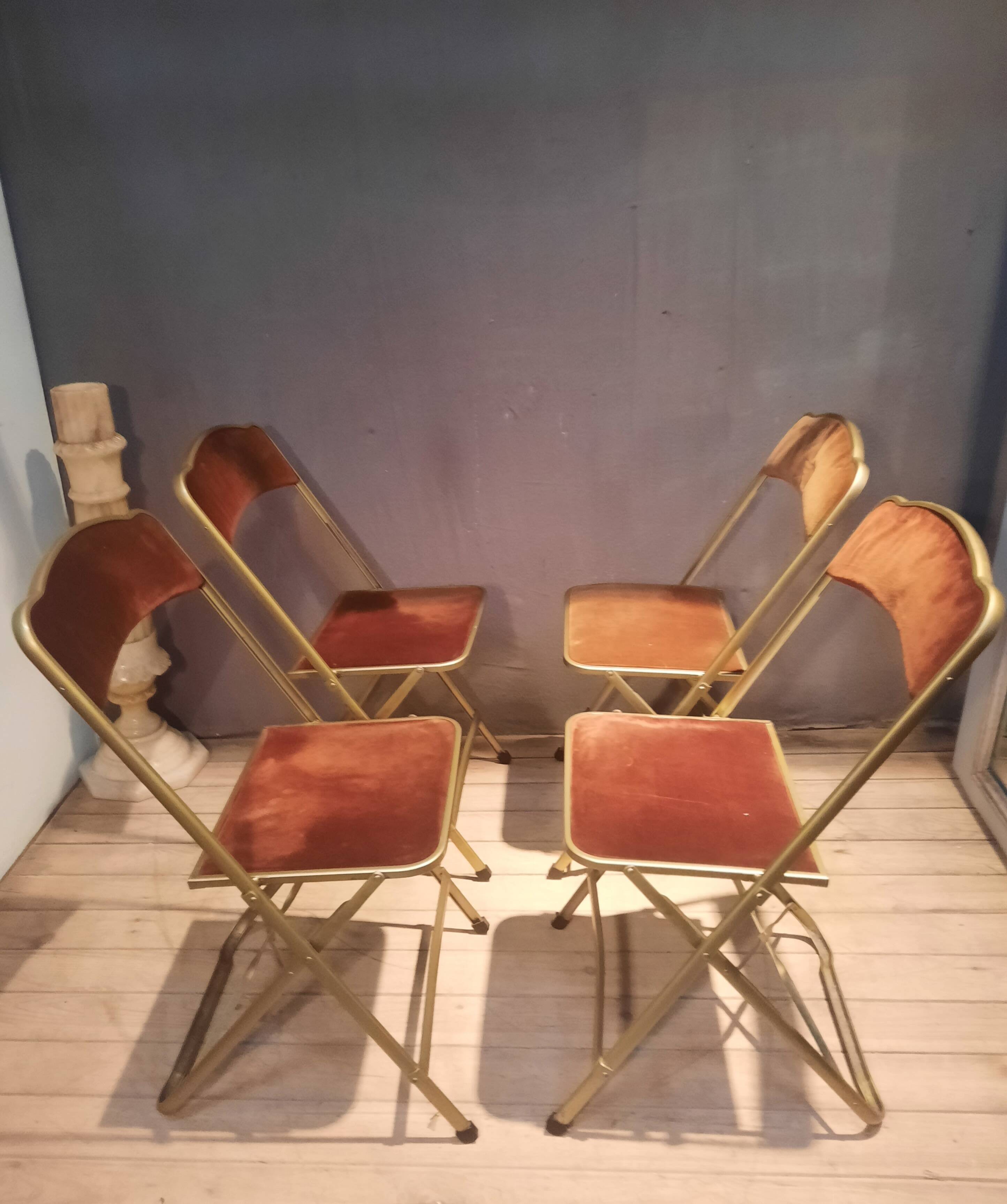 Set of four folding metal and velvet chairs